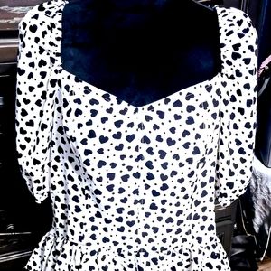 Super cute White/Black heart Top with  sweetheart neckline and ruffled bottom.